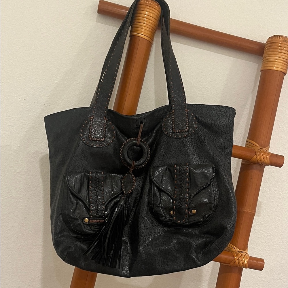Chic Black Leather Tote with brown stitch and Tassel Detail